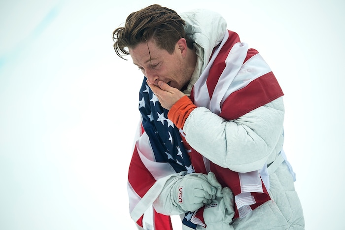 (Chris Detrick  |  The Salt Lake Tribune)  Shaun White reacts to seeing his friends and family after winning gold after his run during the men's halfpipe finals at Phoenix Snow Park during the Pyeongchang 2018 Winter Olympics Wednesday, Feb. 14, 2018.  White won the event with a 97.75, his third Olympic gold medal in the halfpipe (2006, 2010, 2018).