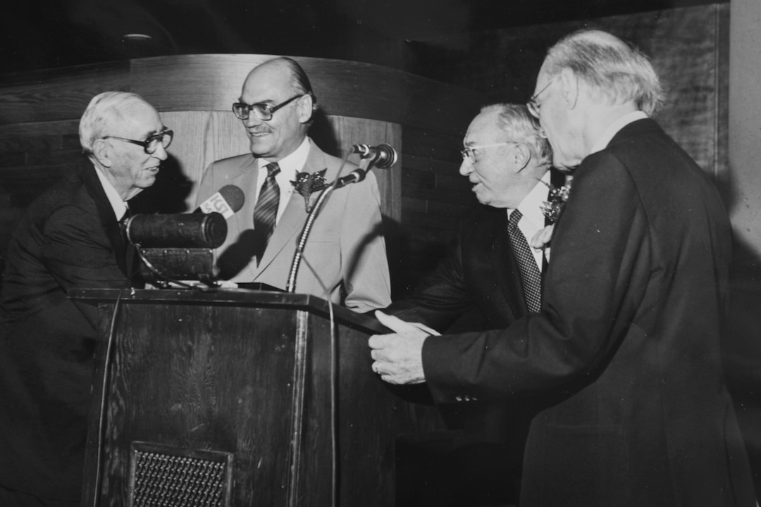(photo courtesy of Utah Symphony) O.C. Tanner, Governor Scott Matheson, Elder Gordon B. Hinckley and Maurice Abravanel attend the opening of Symphony Hall in 1979.