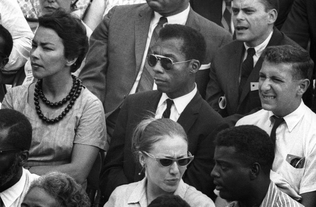 (Dan Budnik | Magnolia Pictures via AP) James Baldwin, center, in the movie "I Am Not Your Negro."