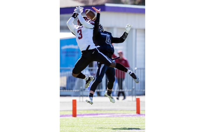 (Rick Egan | The Salt Lake Tribune) Layton Christian Academy wide receiver Malik Johnson goes up for a pass along with Duchesne Eagle, Draker Goodliffe (4), in 1A Football Championship action between the Duchesne Eagles and the Layton Christian Academy Eagles, at the Elizabeth Dee Shaw Stewart Stadium in Ogden, on Saturday, Nov. 13, 2021.