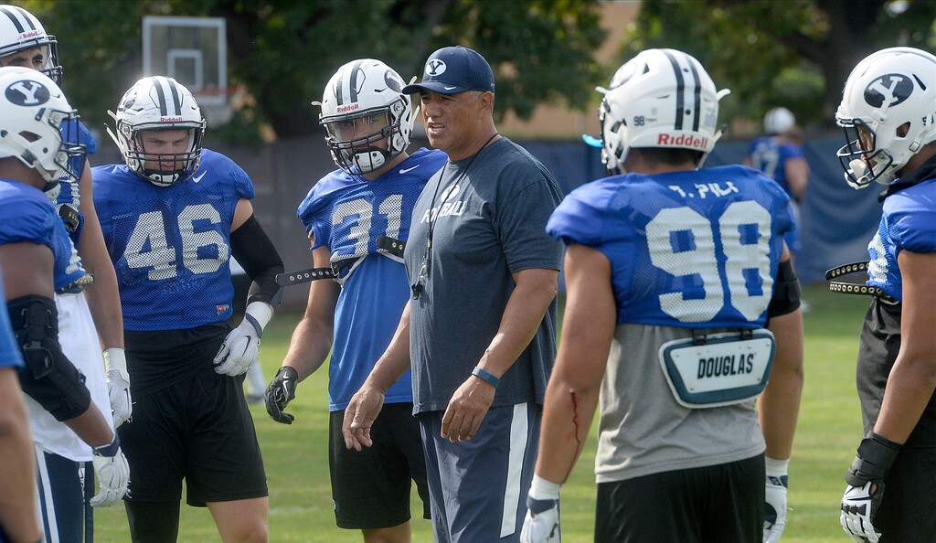 Al Hartmann  |  The Salt Lake TribuneSteve Kaufusi coaches BYU's 2016 defensive line during practice Tuesday Aug 23. 