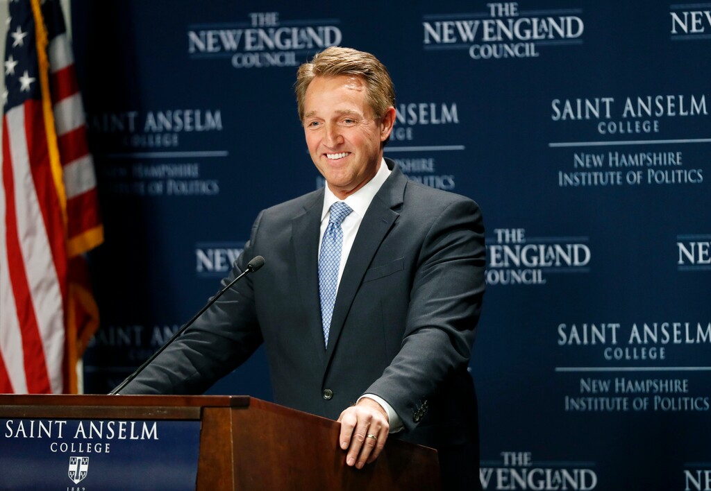 (Winslow Townson | The Associated Press) Sen. Jeff Flake, R-Ariz., smiles while speaking at the New Hampshire Institute of Politics at Saint Anselm College in Manchester, N.H. Friday, March 16, 2018.