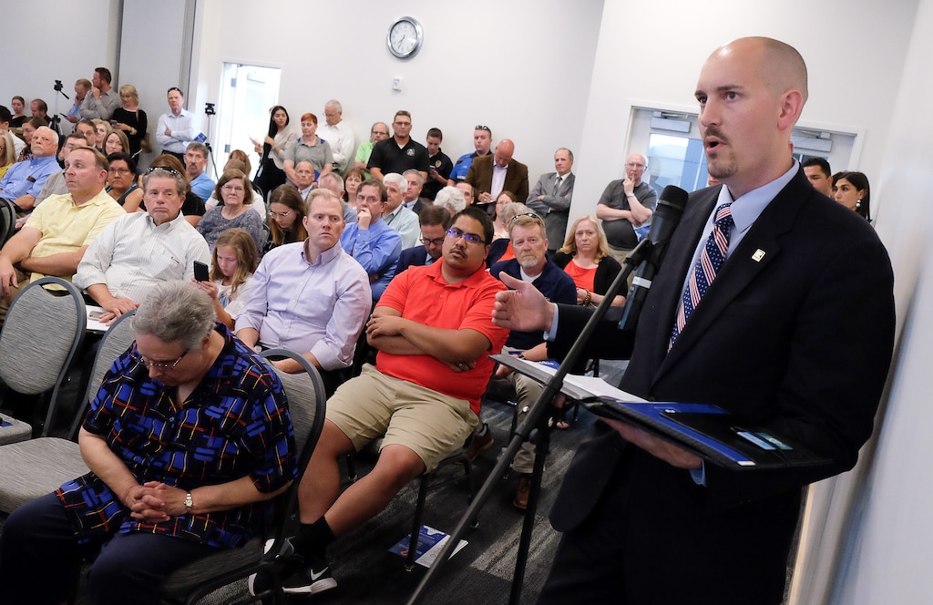 (Francisco Kjolseth | Tribune file photo) Darron Watson with the Salt Lake Board of Realtors brings up the topic of property transfer tax and the effect on home sales as he attends the Utah State Legislature Tax Restructuring and Equalization Task Force town hall meeting in Kearns on Thursday, June 27, 2019. The task force traveled throughout Utah pitching their desire to revamp the tax structure, which could mean expanding what is subject to the sales tax and how much people pay in income tax.