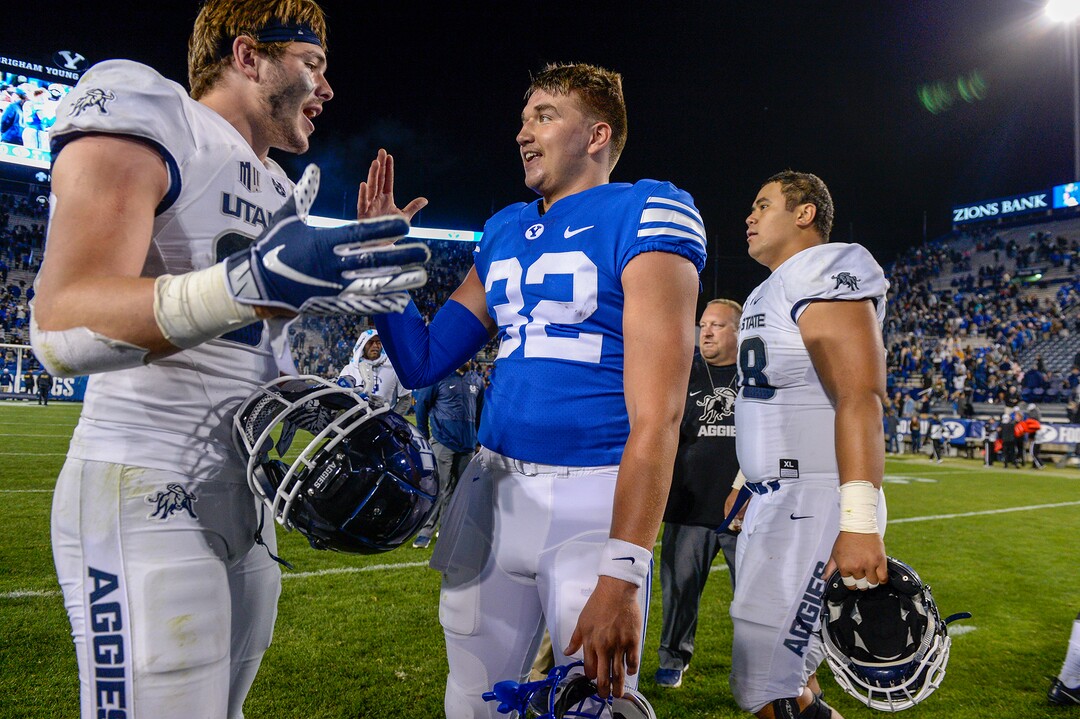 Leah Hogsten  |  The Salt Lake Tribune   Utah State Aggies and Brigham Young Cougars congratulate each other after the game. Utah State University defeated BYU 45-20 at Lavell Edwards Stadium in Provo, Friday, Oct. 5, 2018.