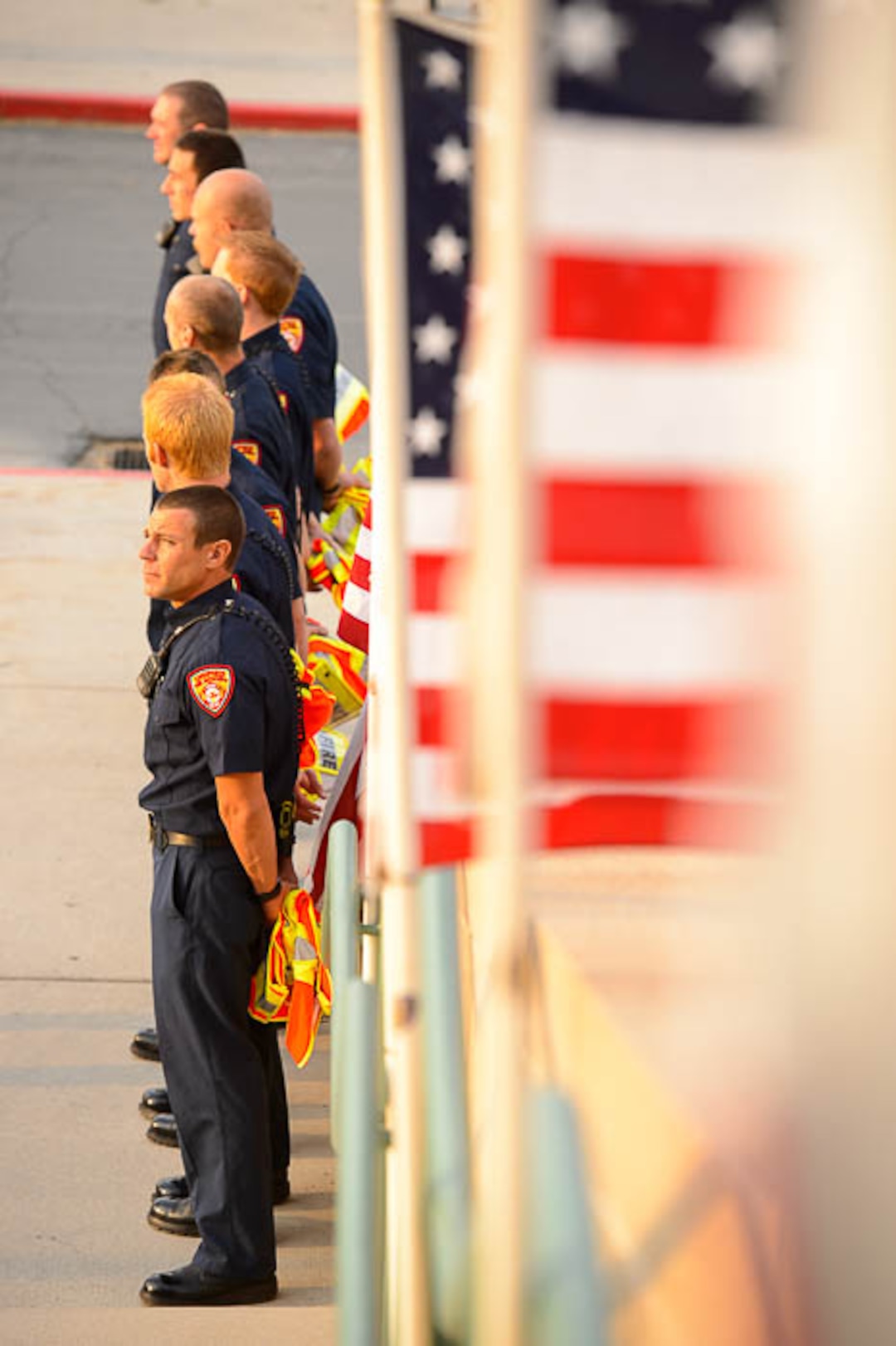 (Trent Nelson | The Salt Lake Tribune)  Firefighters gather for the funeral services for Battalion Chief Matthew Burchett at the Maverik Center in West Valley City, Monday Aug. 20, 2018.