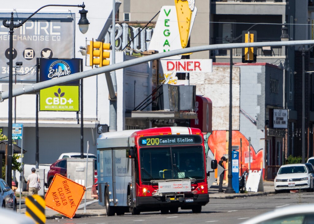 (Rick Egan | The Salt Lake Tribune) A UTA bus drives south on State Street in Salt Lake City Tuesday, Sept. 27, 2022. A severe shortage of bus drivers is forcing the transit authority to cut back bus service this winter.