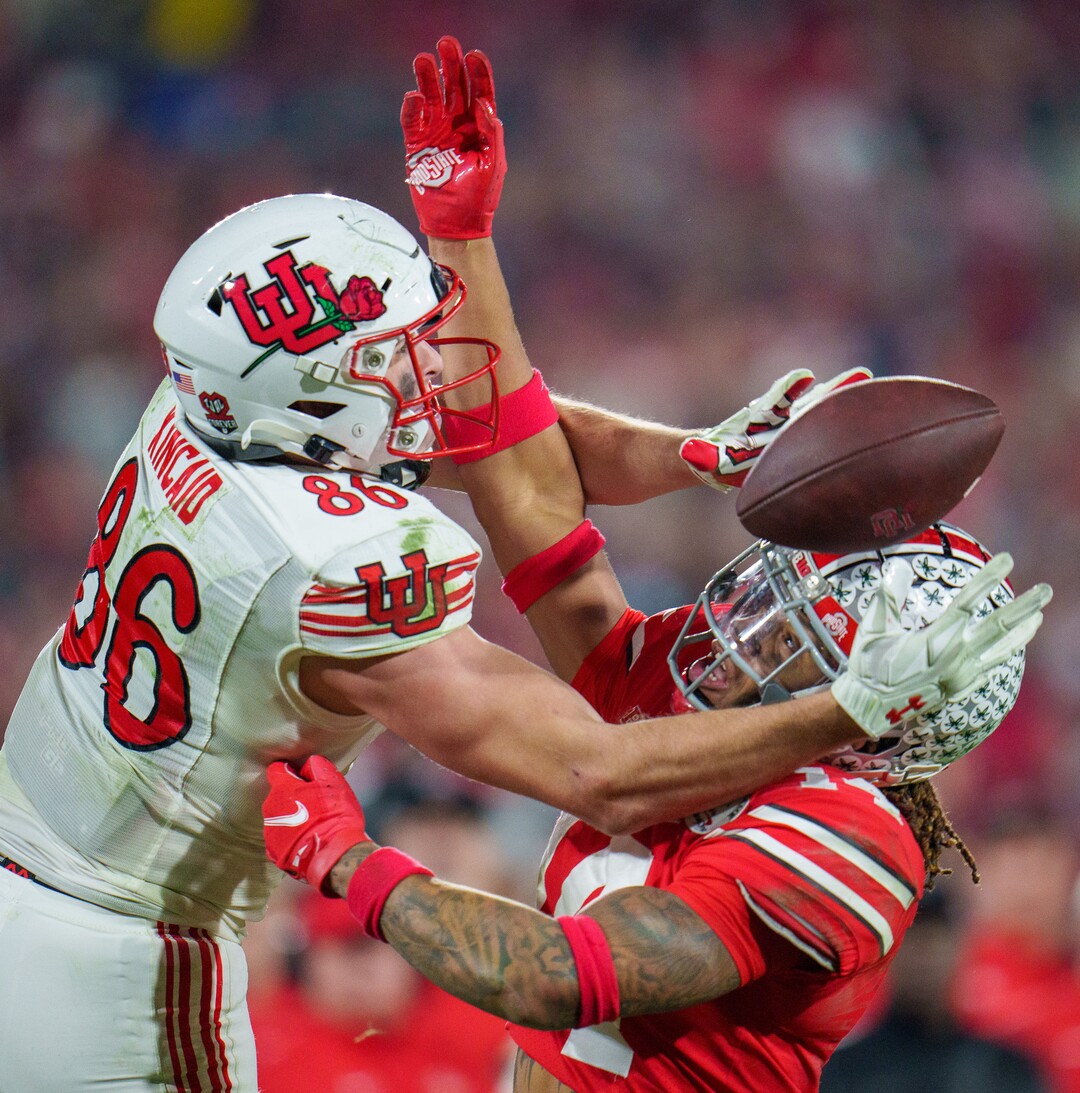 (Trent Nelson  |  The Salt Lake Tribune) Ohio State Buckeyes safety Ronnie Hickman (14) interferes with the pass to Utah Utes tight end Dalton Kincaid (86) as the Utah Utes face the Ohio State Buckeyes at the Rose Bowl in Pasadena, Calif., on Saturday, Jan. 1, 2022.