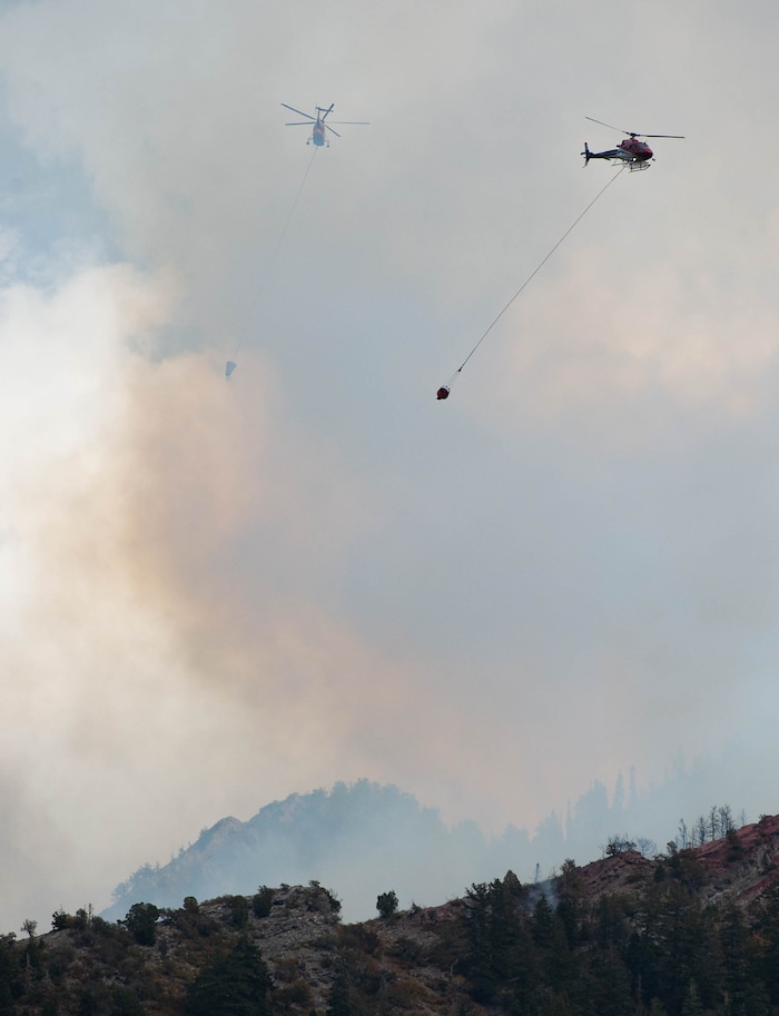 (Francisco Kjolseth  |  The Salt Lake Tribune) Air crews battle a fire in Neffs Canyon on the north side of Mount Olympus on Tuesday, Sept, 22, 2020.