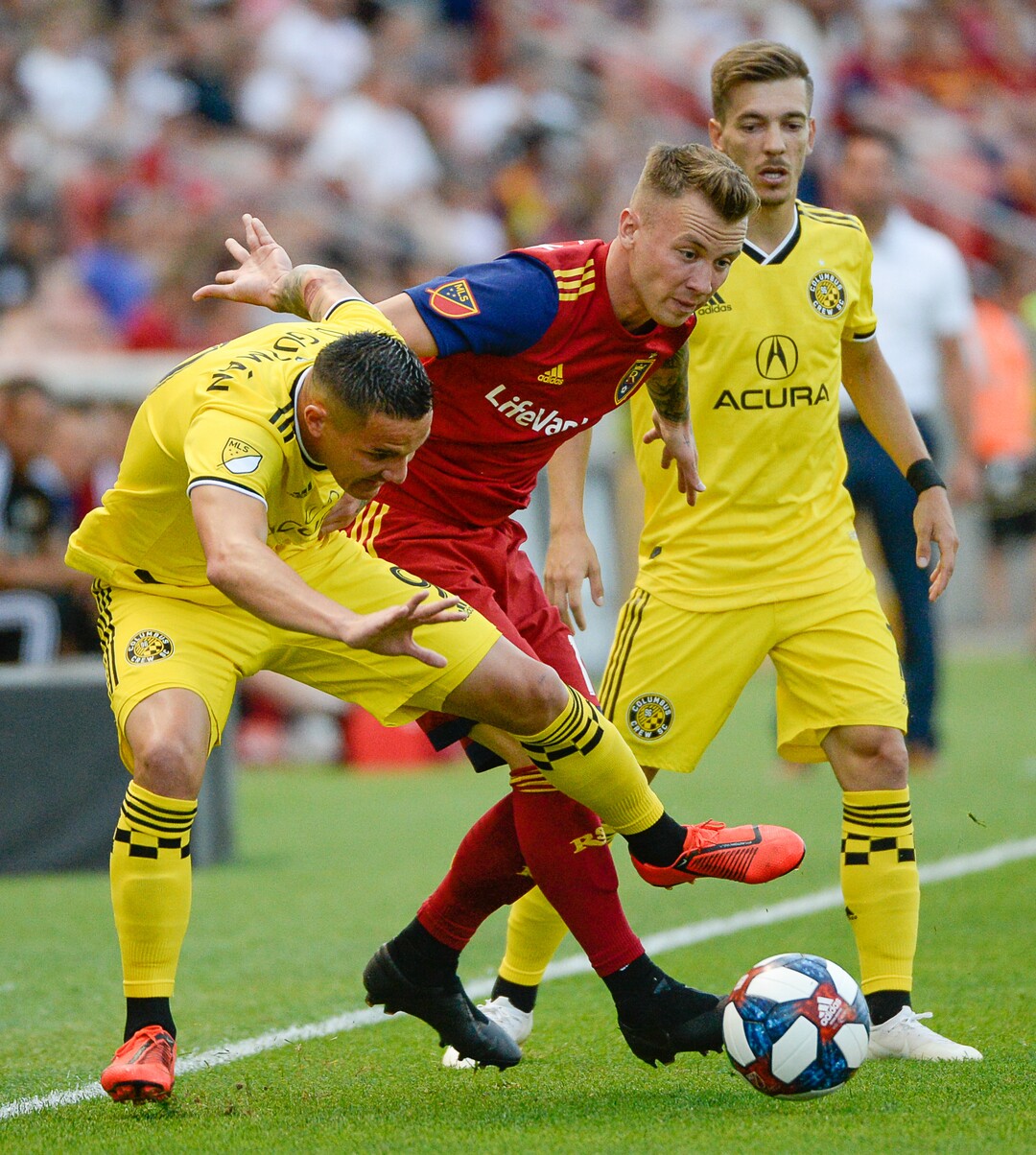 (Francisco Kjolseth  |  The Salt Lake Tribune)  Columbus Crew midfielder David Guzman (9) battles Real Salt Lake midfielder Albert Rusnak (11) as Real Salt Lake hosts Columbus Crew SC, in MLS Soccer at Rio Tinto Stadium in Sandy, Utah on Wed, July 3, 2019.