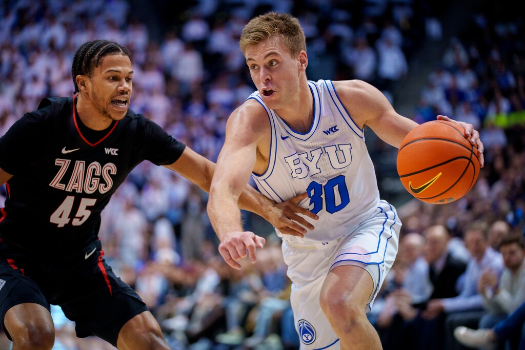 (Trent Nelson  |  The Salt Lake Tribune) Brigham Young Cougars guard Dallin Hall (30) drives on Gonzaga Bulldogs guard Rasir Bolton (45) as BYU hosts Gonzaga, NCAA basketball in Provo on Thursday, Jan. 12, 2023.