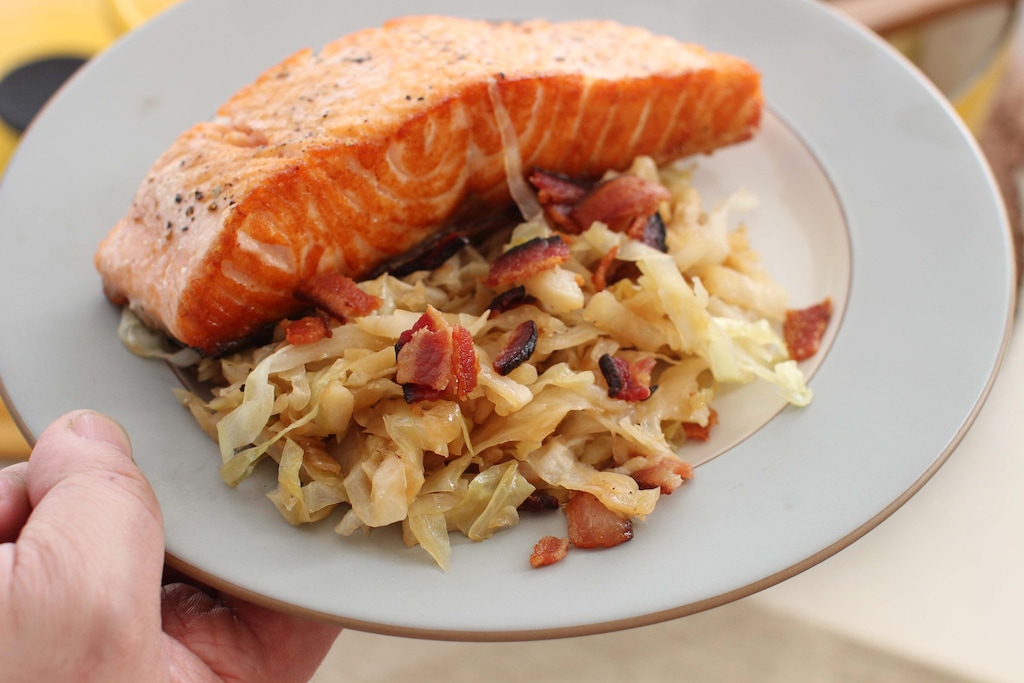 (Matthew Mead | AP) This Jan. 25, 2016 photo shows simple beer braised cabbage with bacon in Concord, N.H. The bacon is crisped up in a large, heavy pot, then some onions are quickly sauteed in a bit of the remaining fat. Then the cabbage is added, along with the beer of your choice, and in 30 minutes you have a dish that may be modest in cost and appearance, but quite grand in flavor.