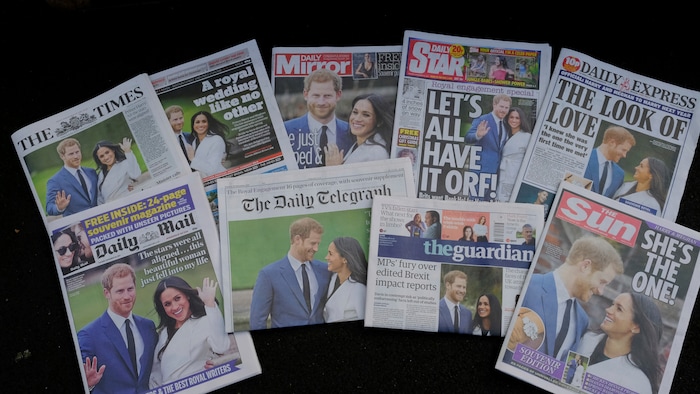 A view of a selection of British national papers on Tuesday, Nov. 28, 2017, showing the coverage of the engagement of Britain's Prince Harry to Meghan Markle. The announcement and press photo call took place at Kensington Palace Monday. (AP Photo/Alastair Grant