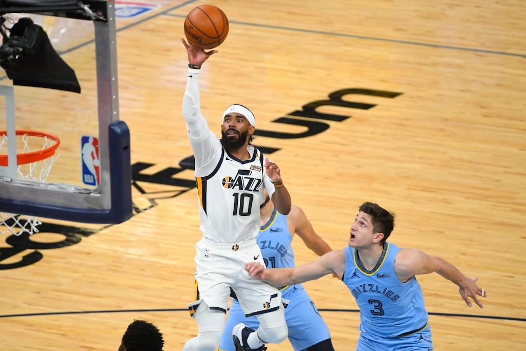 (John Amis | AP) Utah Jazz guard Mike Conley (10) shoots as Memphis Grizzlies guard Grayson Allen (3) defends during the second half of Game 3 of an NBA basketball first-round playoff series Saturday, May 29, 2021, in Memphis, Tenn.