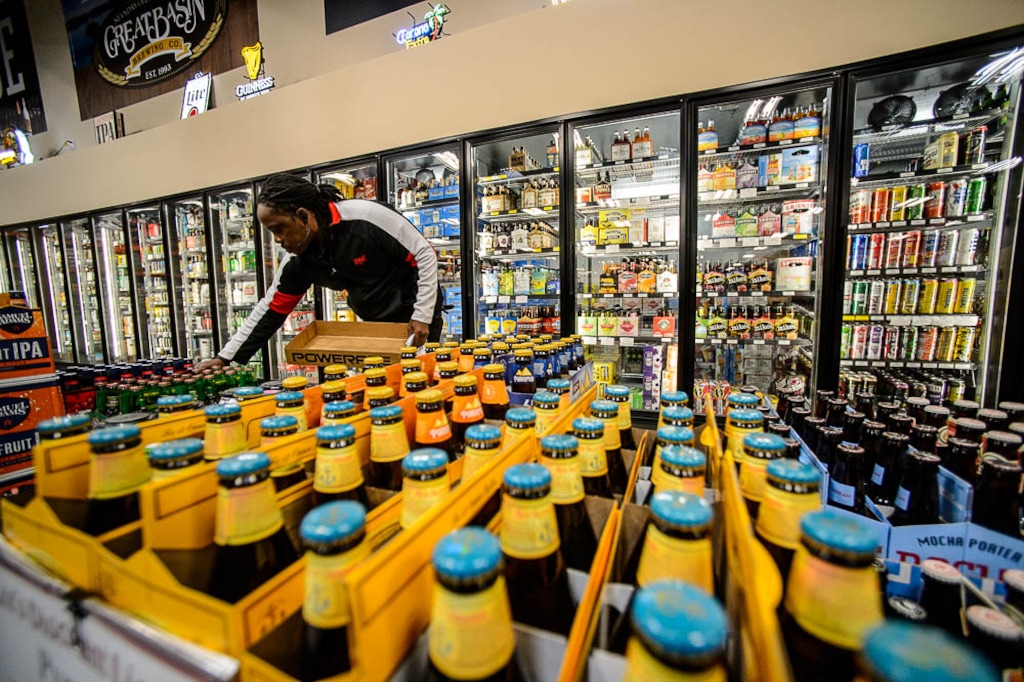 (Trent Nelson | The Salt Lake Tribune) Romell Allen at work stocking the aisles at Lee's Discount Liquor store in West Wendover, Nevada, Tuesday November 7, 2017. It is the 22nd — and largest — store for the large liquor retailer at 30,000 square feet. The Wendover store is surely a temptation for Utah consumers as it carries 6,000 different types of products at lower prices than Utah liquor stores. But it is illegal to bring booze across state lines.