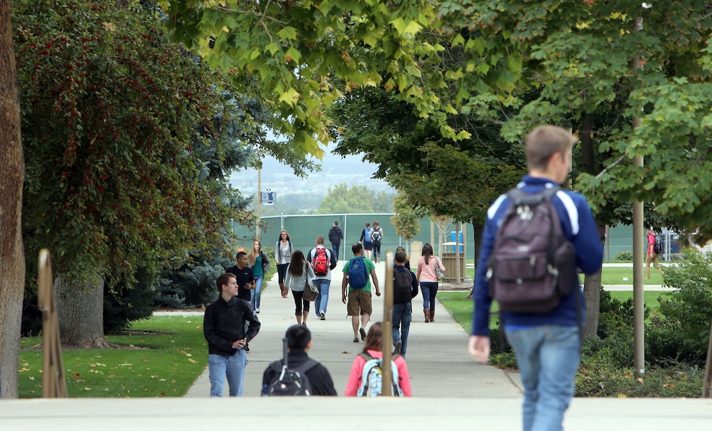 (Francisco Kjolseth  | Tribune file photo)  Students at Brigham Young University in Provo walk on campus in this 2018 photo.
