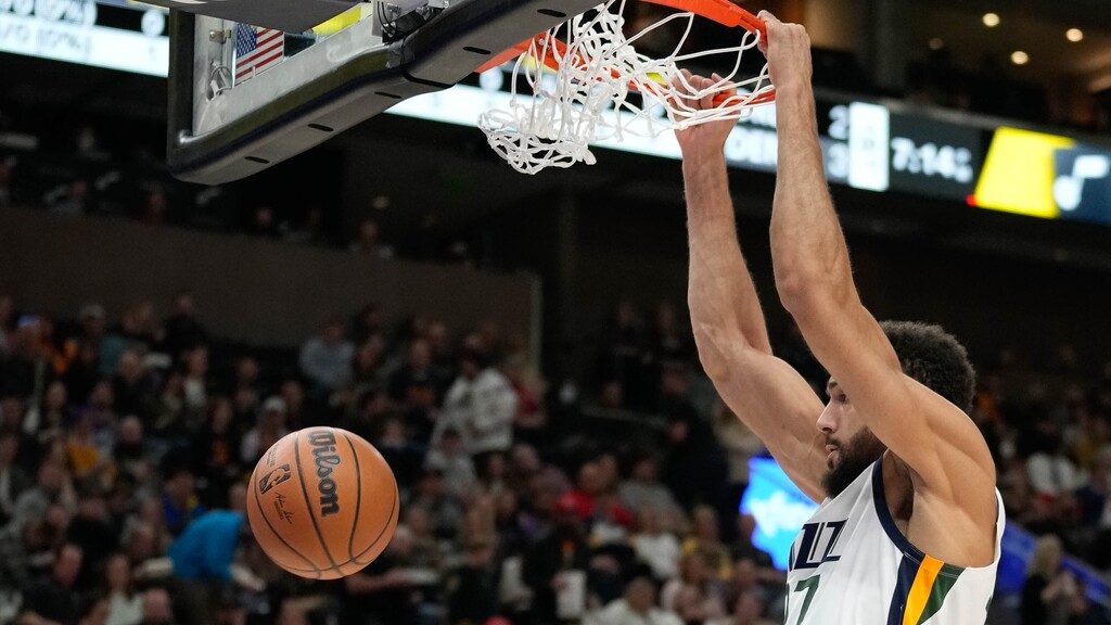 (Francisco Kjolseth | The Salt Lake Tribune) Utah Jazz center Rudy Gobert (27) dunks in the first half as the Utah Jazz host the Houston Rockets at Vivint Arena in Salt Lake City, Monday, Feb. 14, 2022.
