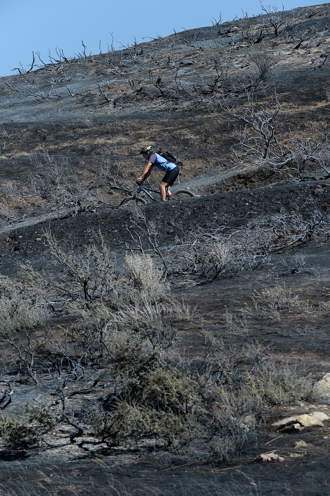 (Francisco Kjolseth  |  The Salt Lake Tribune)  Fire Crews direct a slurry bomber to unload its payload along the East Bountiful bench that grew to 150 acres early Friday morning, Aug. 30, 2019, and destroyed three homes. On Sept. 2, officials said the fire was 100% contained.