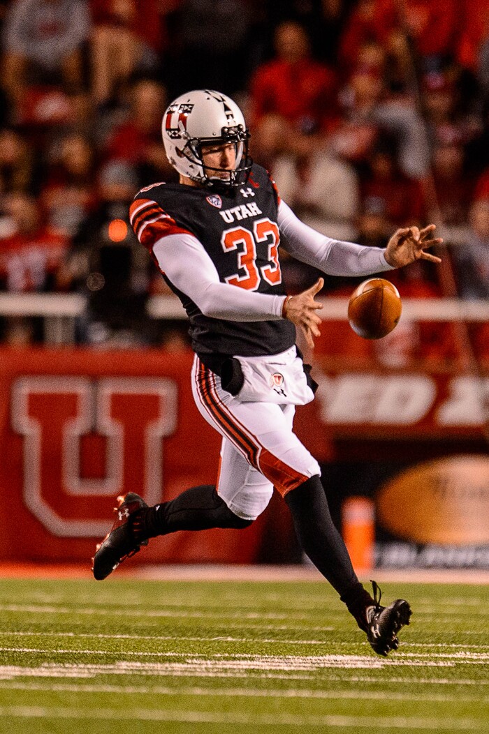 (Trent Nelson | The Salt Lake Tribune) Utah Utes punter Mitch Wishnowsky (33) punts on the run as the Utah Utes host the San Jose State Spartans, NCAA football at Rice-Eccles Stadium in Salt Lake City, Saturday September 16, 2017.