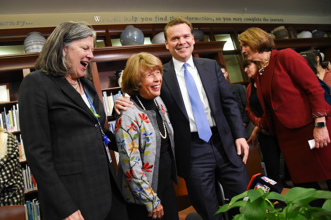(Francisco Kjolseth  |  The Salt Lake Tribune)  Surrounded by clinicians, researchers and staff, Mary Beckerle, CEO of the Huntsman Cancer Institute, Karen Huntsman, chairwoman of the Huntsman Foundation, Peter Huntsman, chairman and CEO of the Huntsman Cancer Foundation, and Ruth Watkins, president of the University of Utah, from left to right, smile as the Huntsman family announces a $30 million donation to the institute on Friday, Jan. 11, 2019.