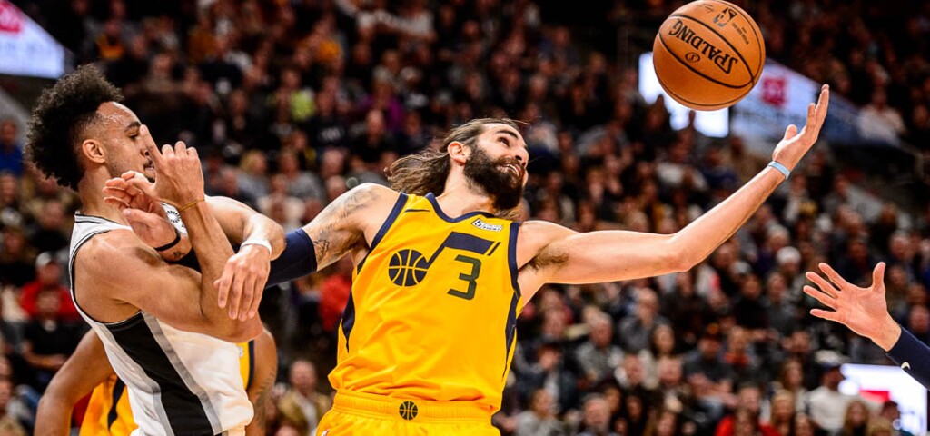 (Trent Nelson | The Salt Lake Tribune)  Utah Jazz guard Ricky Rubio (3) reaches out for the ball with San Antonio Spurs guard Derrick White (4) at left. Utah Jazz v San Antonio Spurs, NBA basketball in Salt Lake City on Tuesday Dec. 4, 2018.