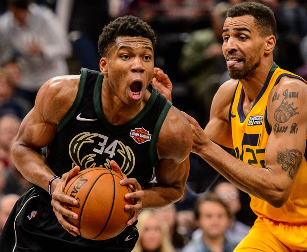 (Trent Nelson | The Salt Lake Tribune)  Milwaukee Bucks forward Giannis Antetokounmpo (34) defended by Utah Jazz forward Thabo Sefolosha (22) as the Utah Jazz host the Milwaukee Bucks, NBA basketball in Salt Lake City Saturday November 25, 2017.