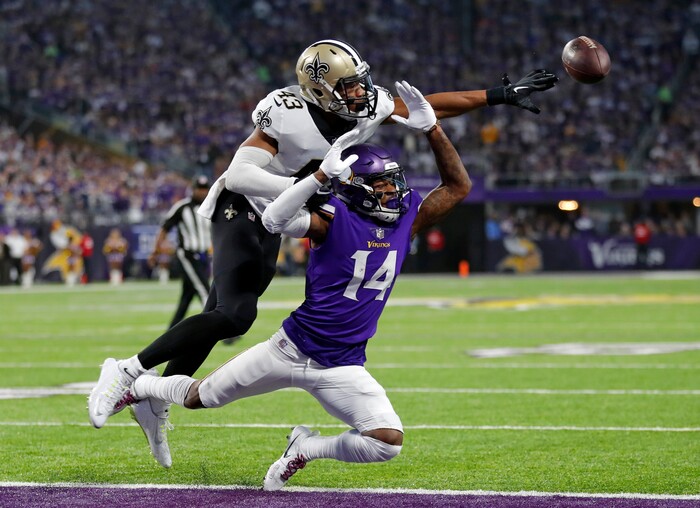 New Orleans Saints free safety Marcus Williams (43) breaks up a pass intended for Minnesota Vikings wide receiver Stefon Riggs (14) during the first half of an NFL divisional football playoff game in Minneapolis, Sunday, Jan. 14, 2018. (AP Photo/Charlie Neibergall)