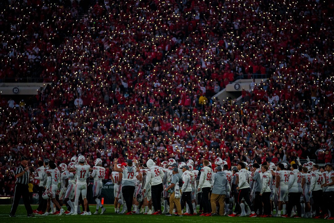 (Trent Nelson  |  The Salt Lake Tribune) Utah fans hold up their phones during a tribute to Utah players Ty Jordan and Aaron Lowe, as the Utah Utes face the Ohio State Buckeyes at the Rose Bowl in Pasadena, Calif., on Saturday, Jan. 1, 2022.
