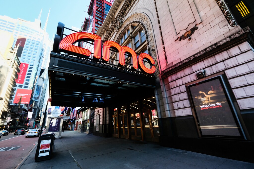 (Evan Agostini/Invision | AP file photo) AMC Empire 25 theatre appears on 42nd Street in New York. The nation’s largest movie theater chain changed its position on mask-wearing less than a day after the company became a target on social media for saying it would defer to local governments on the issue. AMC Theaters CEO Adam Aron said Friday that its theaters will require patrons to wear masks upon reopening, which will begin in July.