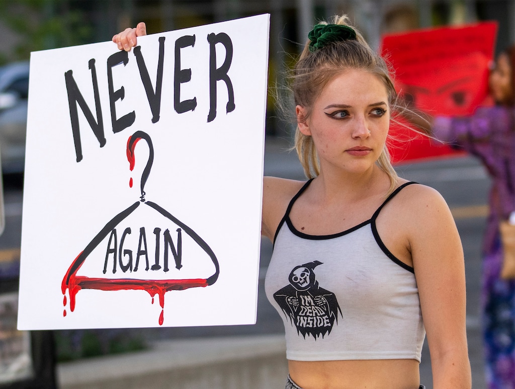 (Rick Egan | The Salt Lake Tribune) Amanda Peterson holds a sign at a rally to defend reproductive rights, sponsored by the Freedom Road Socialist Organization, at the Federal Building, on Wednesday, June 29, 2022.