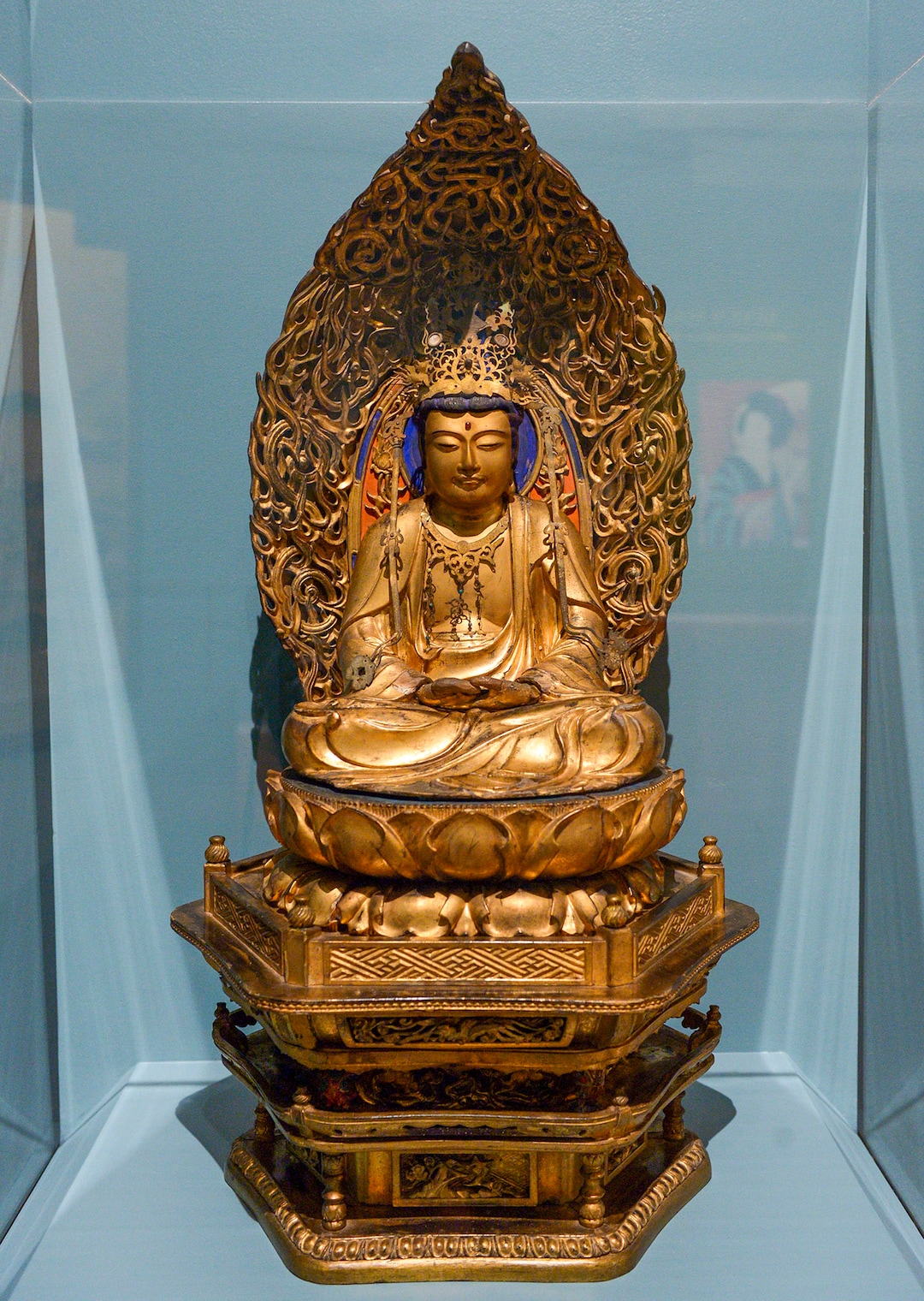 (Leah Hogsten  |  The Salt Lake Tribune) Amitabha Buddha, 19th century, wood lacquer, metal, glass and pigment, by an unidentified artist.The Utah Museum of Fine Arts exhibit Beyond the Divide: Merchant, Artist, Samurai in Edo Japan features scrolls, screens, sculpture, prints and samurai armor and weapons from the UMFAÕs own collection.