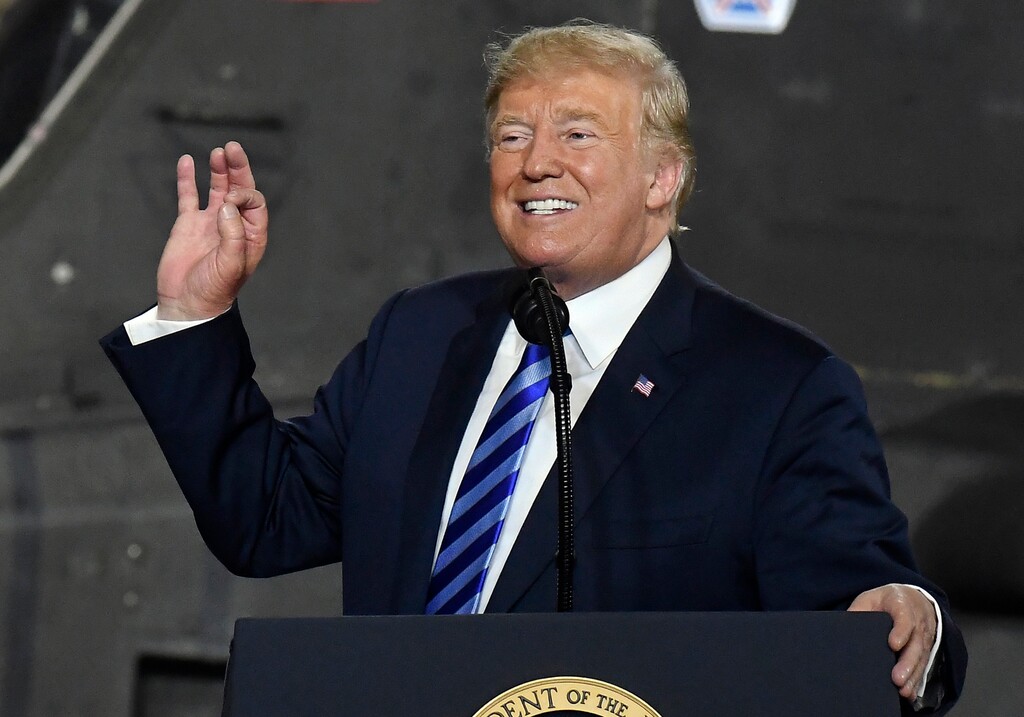 President Donald Trump speaks before signing the $716 billion defense policy bill named for Sen. John McCain during a ceremony Monday, Aug. 13, 2018, in Fort Drum, N.Y. Trump lashed out at Omarosa Manigault Newman on Monday, saying his former White House adviser — who is promoting a tell-all book and airing secret audio recordings —"got fired for the last time." (AP Photo/Hans Pennink)