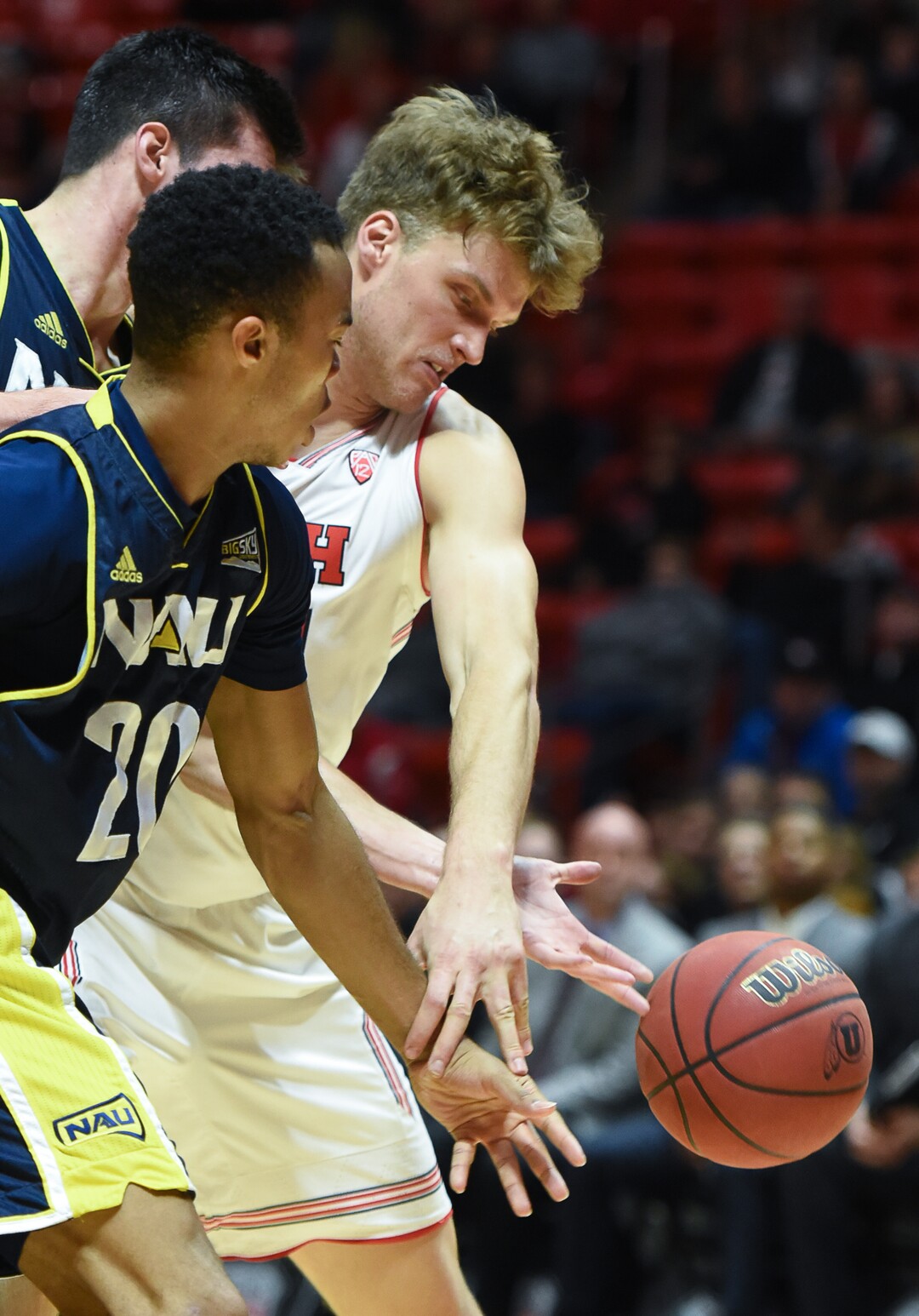 (Francisco Kjolseth  |  The Salt Lake Tribune)  Utah Utes center Jayce Johnson (34) gets pressured by Northern Arizona during the second half of an NCAA basketball college basketball game at the Jon M. Huntsman Center in Salt Lake City, Ut., Friday Dec. 21, 2018.