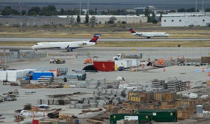 (Francisco Kjolseth  |  The Salt Lake Tribune)  The Salt Lake City Department of Airports gives a tour of the progress being made to replace the three aging terminals with a single central terminal building. Over time, the existing terminal, parking garage and concourses will be completely demolished and replaced with an estimated completion date of 2025.