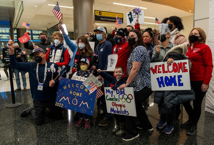 (Rick Egan | The Salt Lake Tribune) Family and friends of Team USA Olympic athletes and coaches wait for their loved ones to arrive at the Salt Lake City International Airport, on Monday, Feb. 21, 2022.  