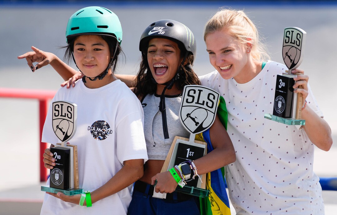 (Francisco Kjolseth | The Salt Lake Tribune) Funa Nakayama of Japan, left, who won the bronze medal during the Tokyo Games, joins Rayssa Leal of Brazil, center, and Roos Zwetsloot of the Netherlands as they celebrate their podium finish in the Street League Skateboarding Championship Tour at the Utah State Fairpark in Salt Lake City on Saturday, Aug. 28, 2021. Now in its 11th year, the sport’s premier competition series includes more of the world’s best skaters than ever before, with the tour roster featuring 47 athletes hailing from 11 countries, including 21 Olympians and multiple X Games medalists.