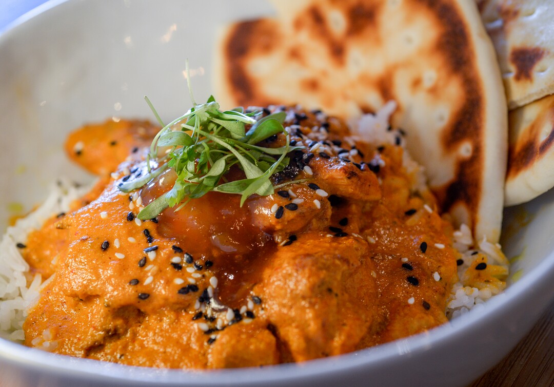 (Leah Hogsten  |  The Salt Lake Tribune) Cotton KitchenÕs Butter Chicken with jasmine rice, mango chutney, micro clilantro, cashew nuts, parsley oil, sesame seeds and served with pita bread, $13. Cotton Kitchen serves an all-day breakfast and lunch. While a global influence is apparent, the menu feels most cohesive around the clean-eating concept, focusing on health-conscious and plant-based dishes made with as few ingredients as possible.