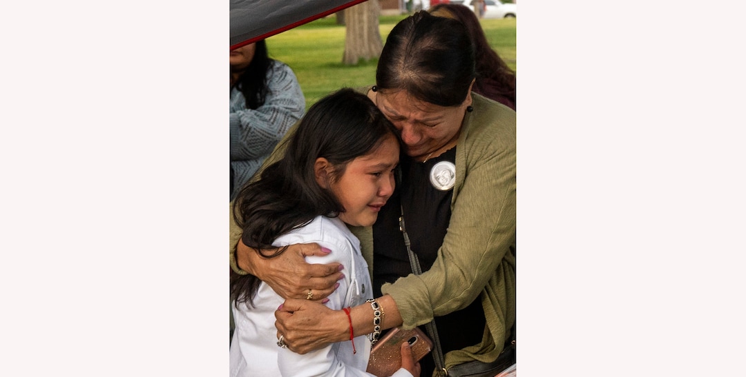 (Rick Egan | The Salt Lake Tribune) Bernardo's mother, Lucy Palacios-Carbajal hugs nine-year-old Julie Aragon, Bernardo's cousin, at the "Long Live Loske" gathering at Rose Park on Saturday, May 22, 2021, as the family of Bernardo Palacios-Carbajal hosted a "1st Heavenly Anniversary" event to celebrate the life of their son and brother to mark the 1-year anniversary of his death on May 23, 2020 by Salt Lake City Police, who fired 34 shots, killing the 22-year-old man.