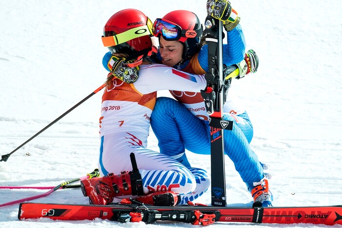 (Chris Detrick  |  The Salt Lake Tribune)  Italy's Federica Brignone, right, comforts USA's Mikaela Shiffrin as she realizes she has won the gold in the Ladies' Giant Slalom at Yongpyong Alpine Centre during the Pyeongchang 2018 Winter Olympics Thursday, Feb. 15, 2018.  Shiffrin won the event with a time of 2:20.02. Mowinckel won silver and Brignone won bronze. 