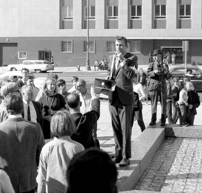 (photo courtesy Joe Bauman)  Bruce Phillips speaks to group of protesters in downtown Salt Lake City at the beginning of a march against the Vietnam War on Oct. 21, 1967. Ammon Hennacy led the march to the Cathedral of the Madeleine as a stand against the local diocese's support of the war.