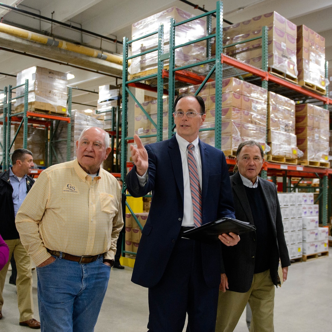 (Trent Nelson  |  The Salt Lake Tribune)  Agriculture Secretary Sonny Perdue on a tour of Welfare Square in Salt Lake City on Wednesday May 22, 2019. From left, Perdue, Bishop W. Christopher Waddell, and Gov. Gary Herbert.