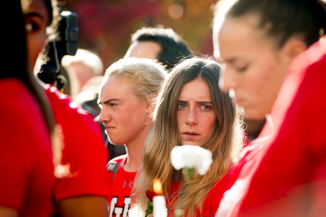 (Jeremy Harmon  |  The Salt Lake Tribune) Members of the University of Utah track team gather during a vigil for teammate Lauren McCluskey on Wed. Oct 24, 2018. McCluskey was killed on campus on Monday.