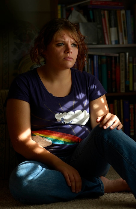Leah Hogsten  |  The Salt Lake Tribune Kylie Toponce, 23, just filed for bankruptcy after racking up$36,000 in medical bills in emergency room care due to an undiagnosed stomach ailment, September 26, 2014. She falls in Utah's Medicaid coverage gap, but could benefit from Gov. Gary Herbert's proposed Healthy Utah plan. An alternative to Medicaid, Healthy Utah would provide subsidies to low-income people like Kylie, so they can buy health insurance in the marketplace.