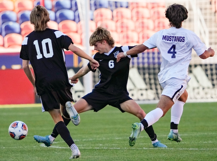 (Francisco Kjolseth | The Salt Lake Tribune) Davis's Braxton Passey (6) works the field alongside Davis’s Miles Iverson (10) and Herriman's Jason R. Dunham (4) during their 6A State Soccer Championship title game at Rio Tinto Stadium, Wednesday, May 25, 2022. Herriman defeated Davis 1-0 with two seconds left on the clock.