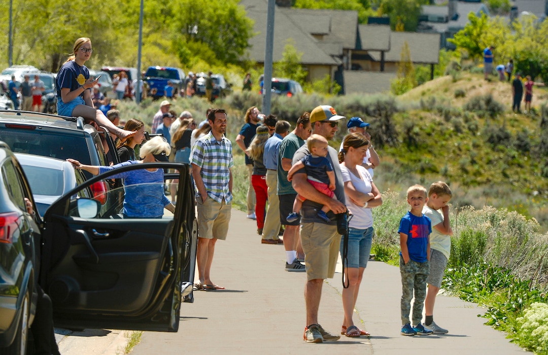 (Leah Hogsten  |  The Salt Lake Tribune) Onlookers lined Bountiful Blvd. to get a glimpse of the F-35’s passing through Davis County.  In support of the healthcare workers, first responders and essential personnel on the front lines of the fight against COVID-19, Hill Air Force Base’s F-35 pilots from the Demo Team and the 388th Fighter Wing flew over the state, April 30, 2020.