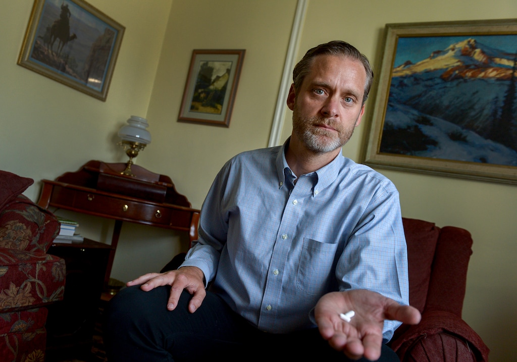 Leah Hogsten | The Salt Lake Tribune Nathan Frodsham is hoping the ballot initiative to legalize medical marijuana in Utah passes so he can get off opioids and back to using the vaporized form of marijuana he formerly used when he lived in Seattle to treat chronic osteoarthritis pain in his neck from a degenerative disc disorder, Friday, June 8, 2018. Frodsham said he takes on average two Percocet pills a day.
