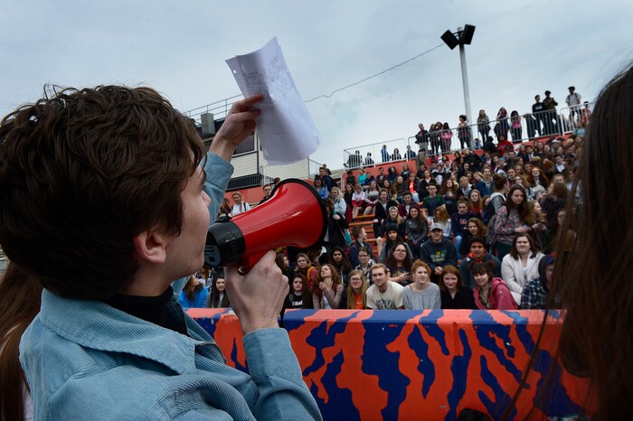Scott Sommerdorf | The Salt Lake Tribune
Student organizer Isaac Reese addresses the crowd of students who walked out of class at Brighton High and gathered in the football stadium. The students read aloud the names of each of the 17 students and staff killed at Marjory Stoneman Douglas High School, during their walkout at Brighton High School, Wednesday, March 14, 2018.
