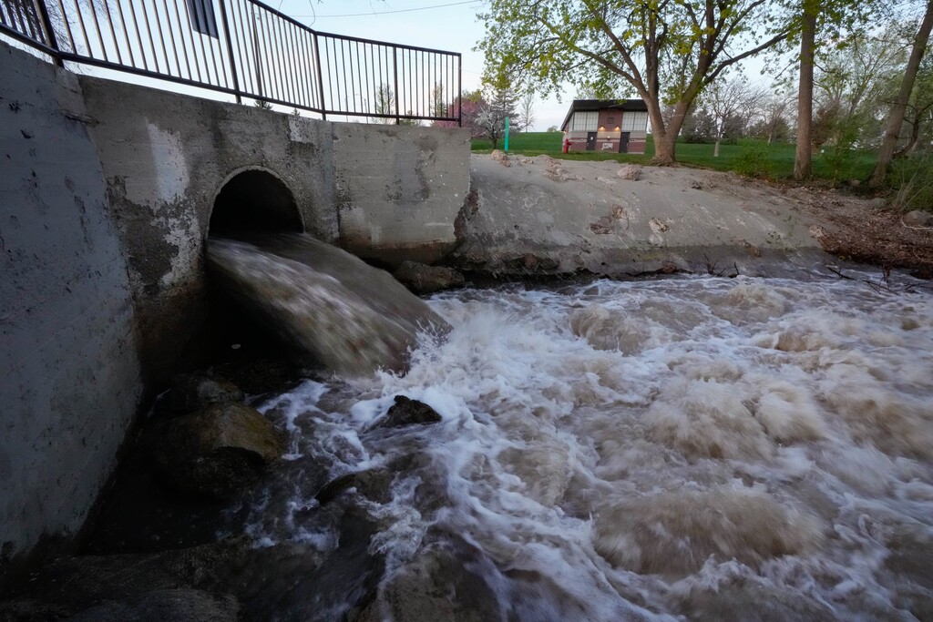 (Francisco Kjolseth | The Salt Lake Tribune) Parleys Creek surges through Sugar House Park, which remains closed as high water levels continue to fluctuate on Wednesday, May 3, 2023.