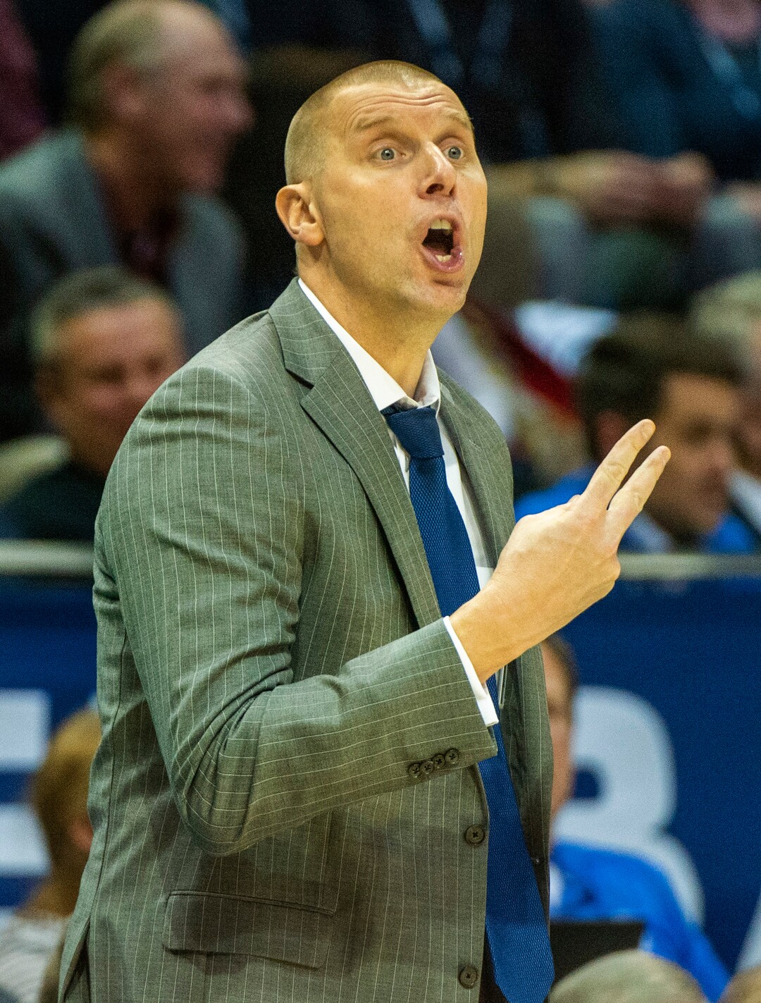 (Rick Egan  |  The Salt Lake Tribune)         Brigham Young Cougars head coach Mark Pope shouts instructions to his players, in basketball action between the Brigham Young Cougars and the Nevada Wolf Pack, at the Marriott Center, in Provo, Saturday, December 10, 2019.