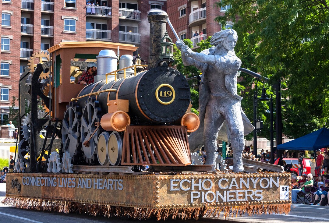 (Rick Egan | The Salt Lake Tribune) The Echo Canyon Pioneers float on the Sweepstakes Award, in the Days of '47 Parade, in Salt Lake City, on Friday, July 23, 2021.