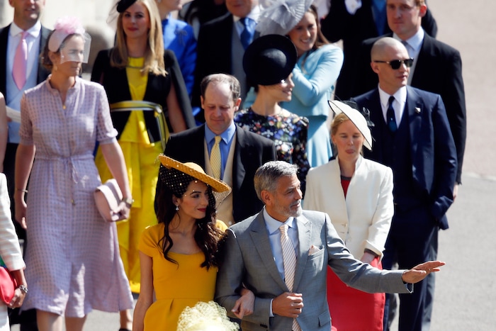 George Clooney and his wife Amal Clooney arrive for the wedding ceremony of Prince Harry and Meghan Markle at St. George's Chapel in Windsor Castle in Windsor, near London, England, Saturday, May 19, 2018. (Odd Anderson/pool photo via AP)